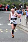 Steve Cairns (Tyne Bridge) finishing the Tynedale Jelly 10 Road Race. Photo: David T. Hewitson/Sports for All Pics